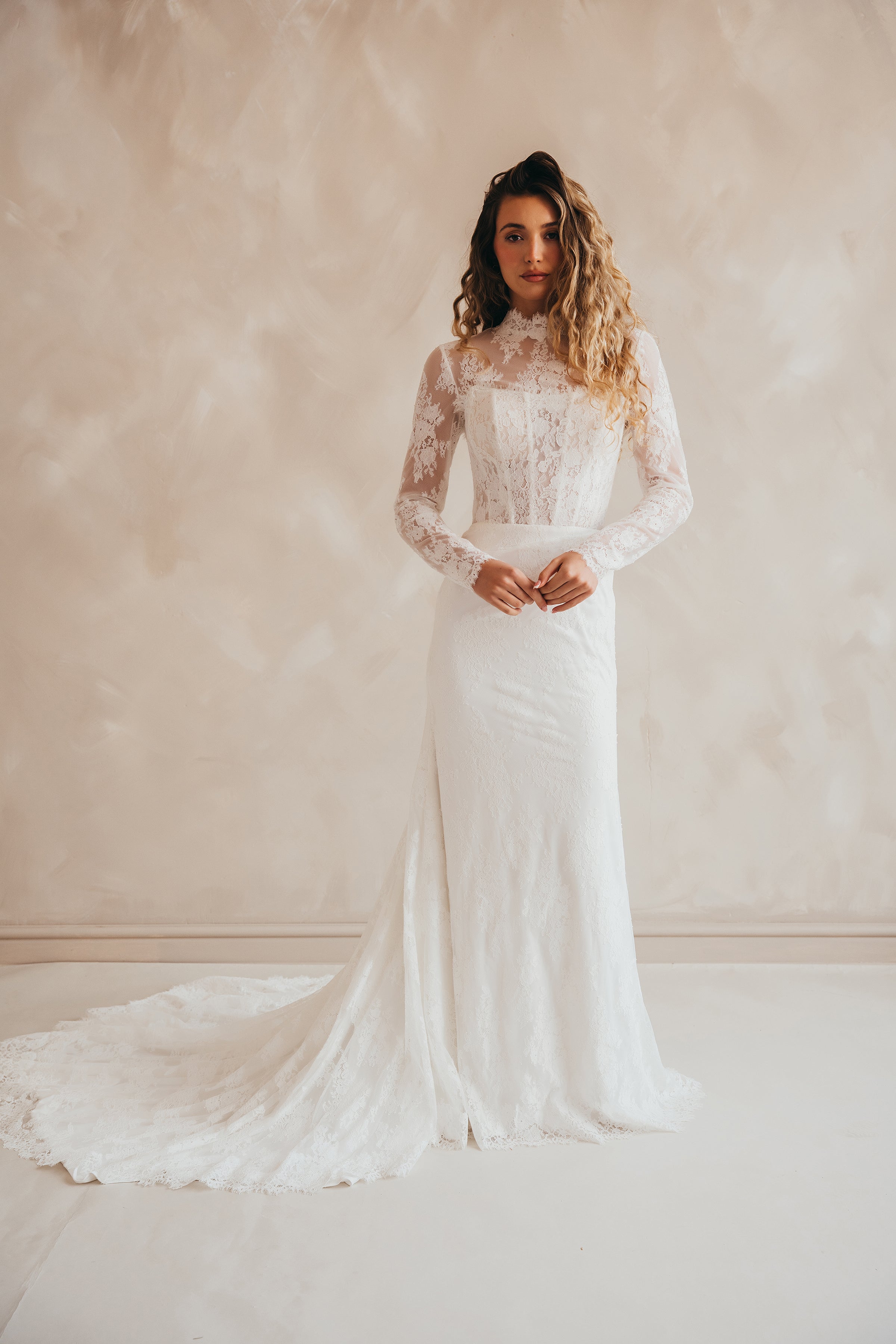 Fitted lace wedding topper with sophisticated high neck design
