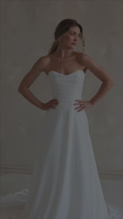 Bride wearing the Finola strapless chiffon wedding dress with ruched bodice.